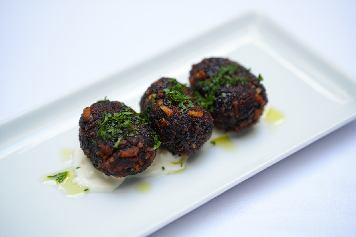 Croquetas de tinta de chipirones